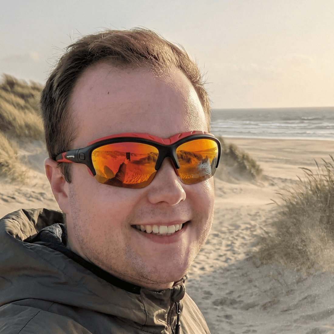 Pursuit | Black & Red Photochromic Sunglasses with Electric Red Lenses with foam insert, image 2.