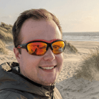 Pursuit | Black & Red Photochromic Sunglasses with Electric Red Lenses with foam insert, image 2.
