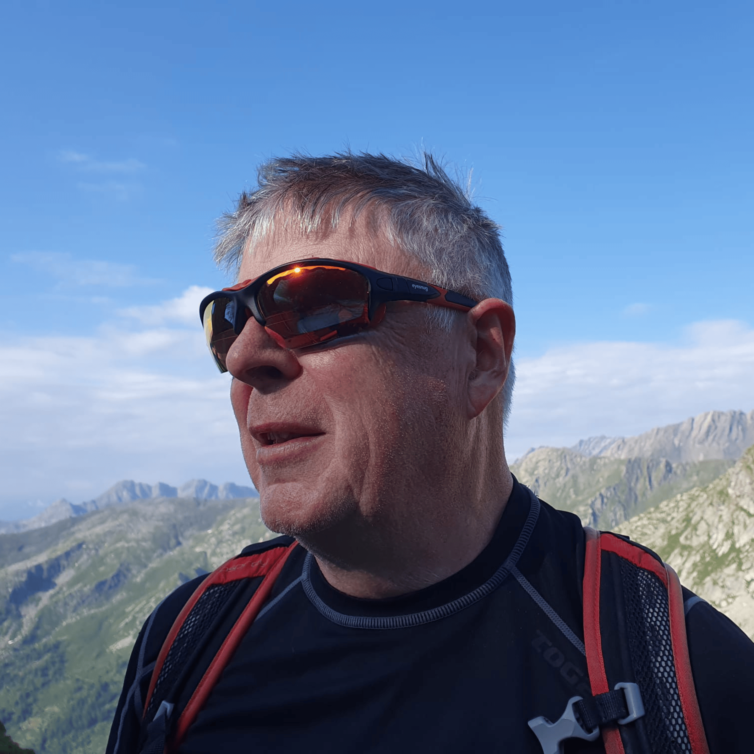 Pursuit | Black & Red Photochromic Sunglasses with Electric Red Lenses